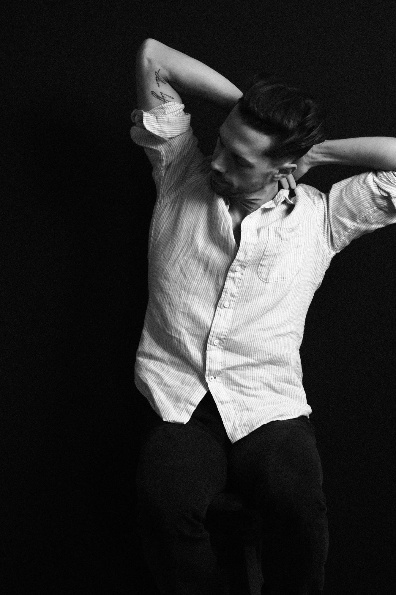 Portrait of Mateo Danza in dramatic black-and-white light
